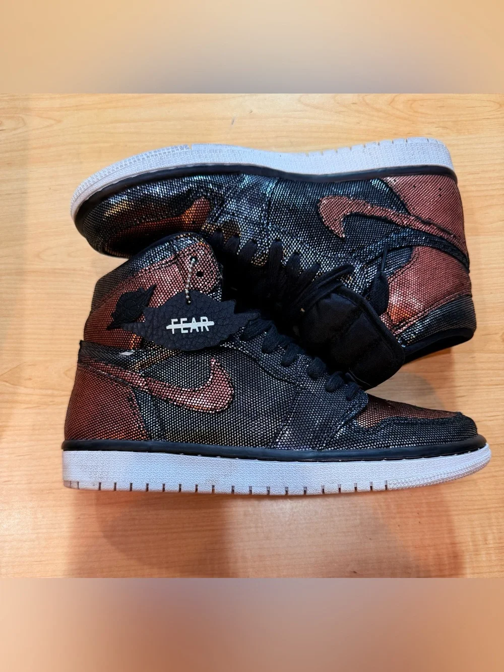 Nike Air Jordan 1 Mid in Black and Copper